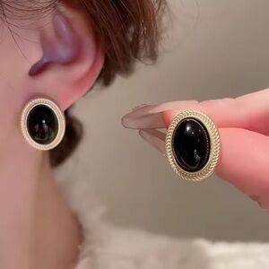Elegant Black and Gold Oval Earrings